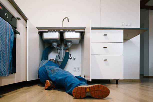 Professional Plumbing technician working in Brookville, NY